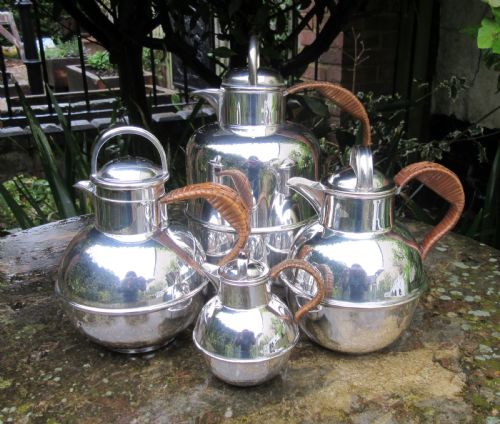 Group of 4 Silver Plated Guernsey Milk Cans