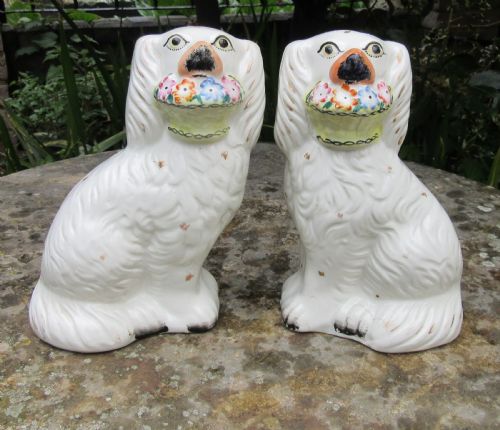 Pair Victorian Staffordshire Dogs with Baskets C1860