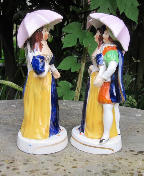 fig 1. TWO MATCHING STAFFORDSHIRE DANCING UMBRELLA FIGURES c1860