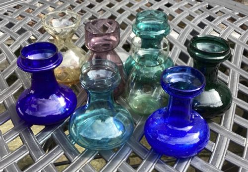 Eight Coloured Glass Hyacinth Vases