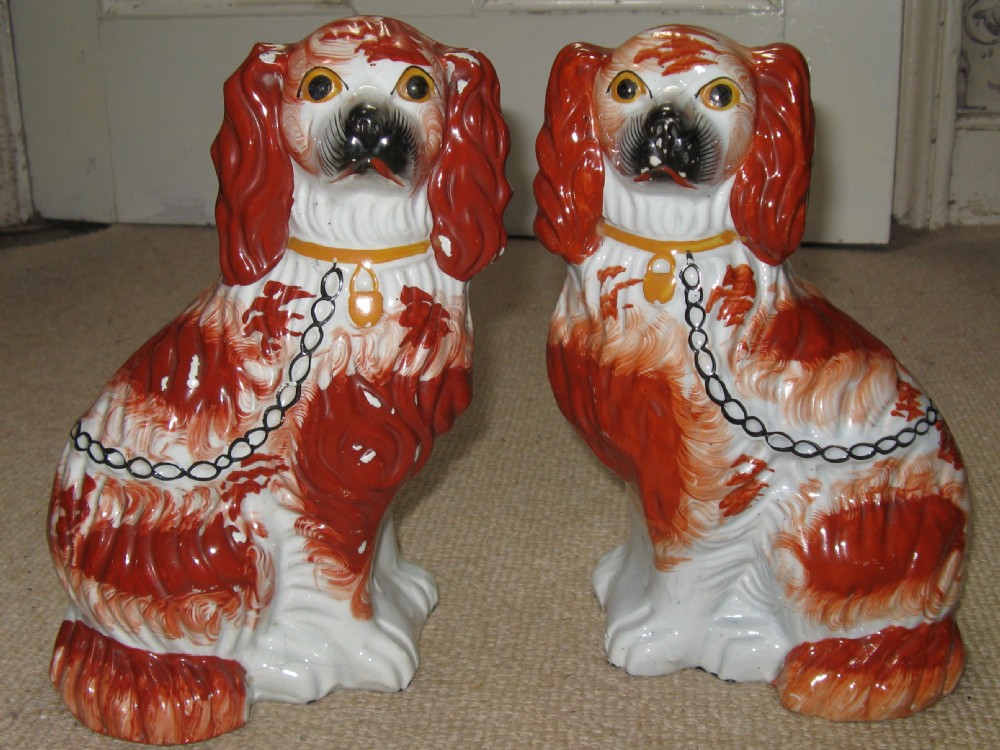 PAIR OF STAFFORDSHIRE RED & WHITE SPANIEL DOGS  circa 1860