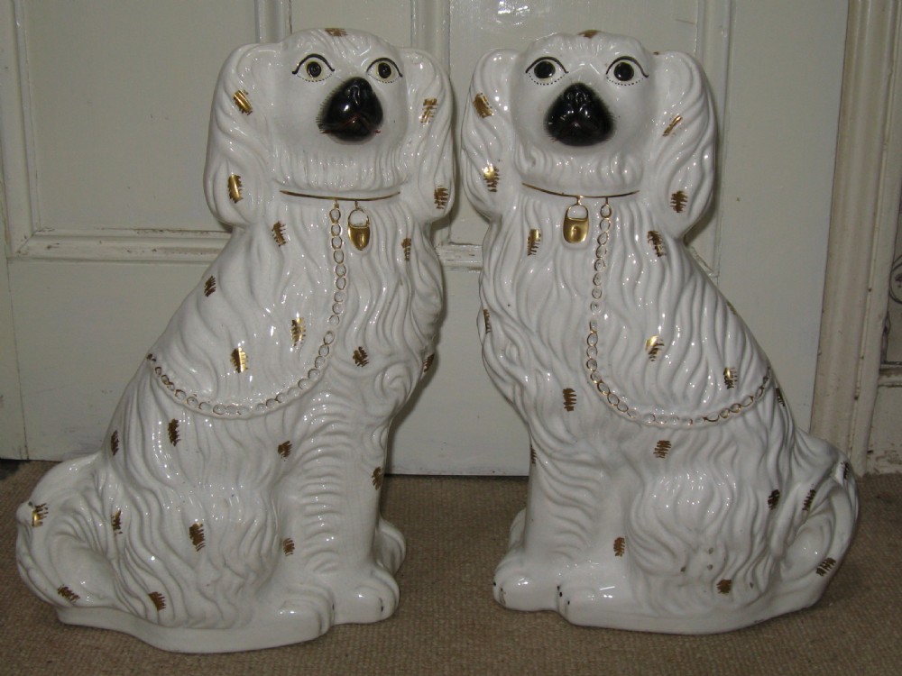 VERY LARGE PAIR OF VICTORIAN STAFFORDSHIRE WHITE & GILT DOGS circa 1860