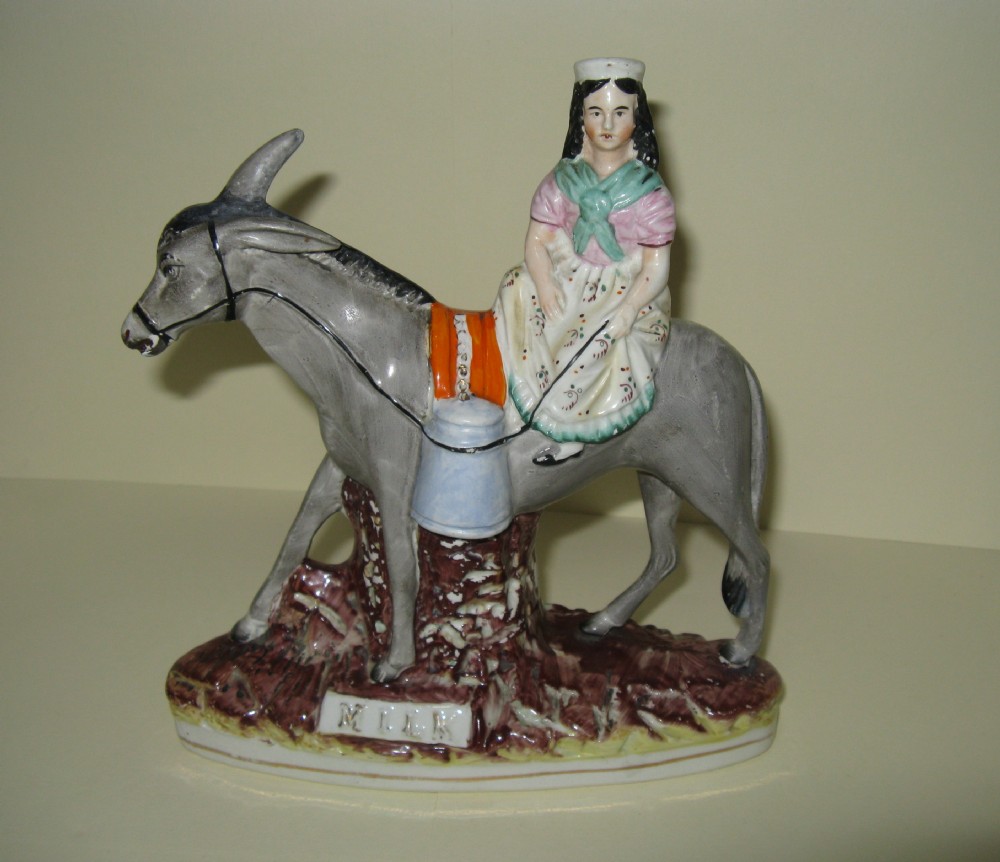 VICTORIAN STAFFORDSHIRE FIGURE of MILKMAID ON A DONKEY c1880