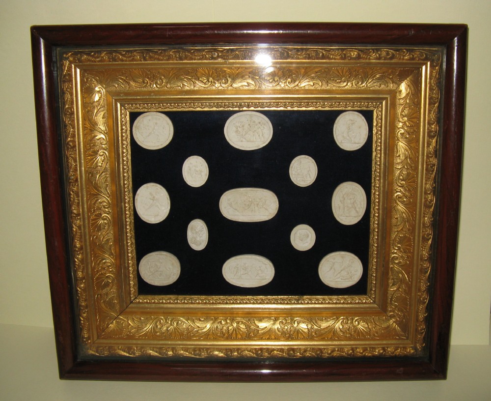 COLLECTION OF CLASSICAL GRAND TOUR INTAGLIOS IN VICTORIAN GILDED FRAME 