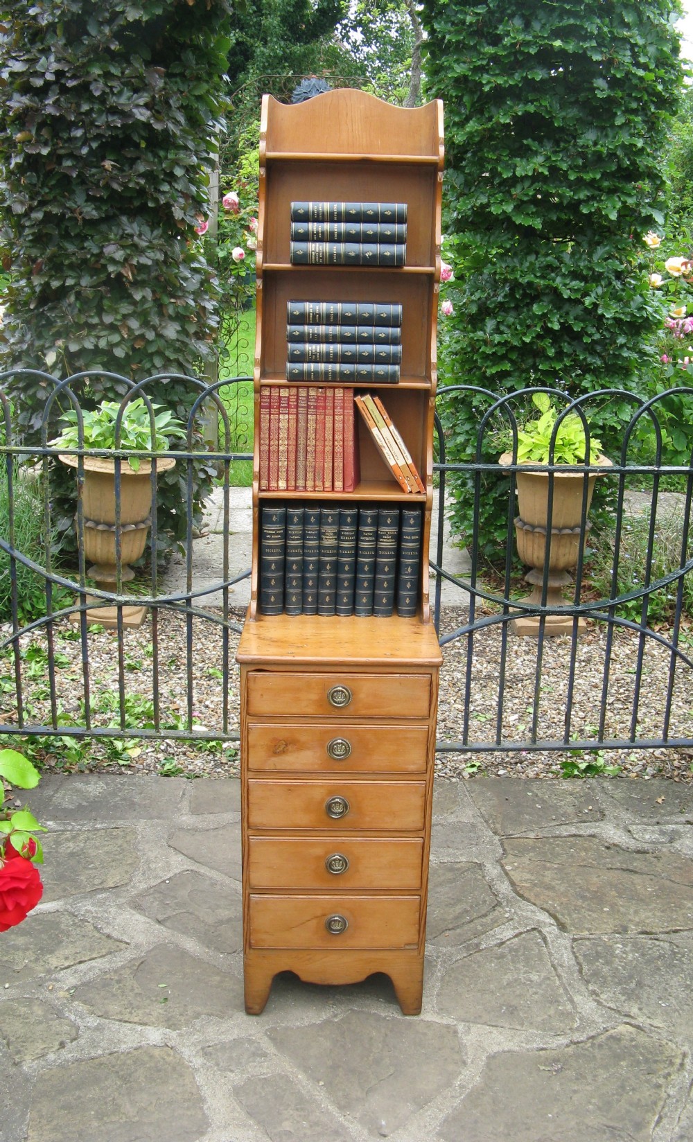 REGENCY PINE WATERFALL BOOKCASE OF SLIM PROPORTIONS
