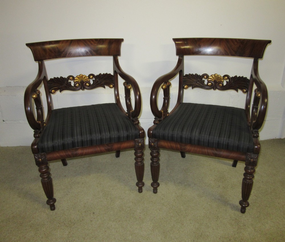 Pair of 19th Century Mahogany and Parcel Gilt Open Arm Chairs