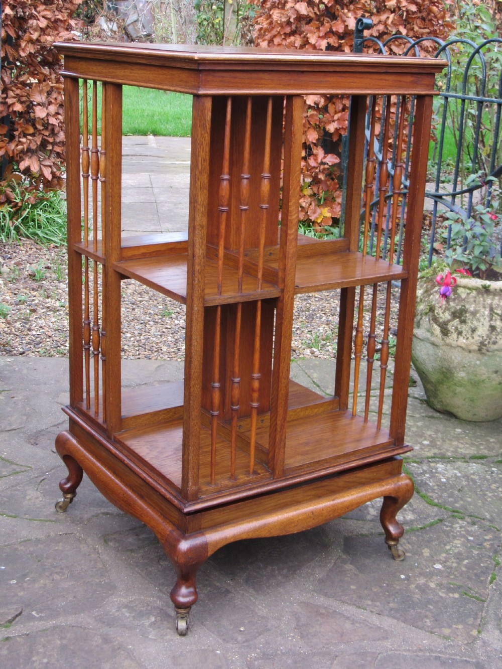 JAMES SHOOLBRED REVOLVING OAK BOOKCASE c1900