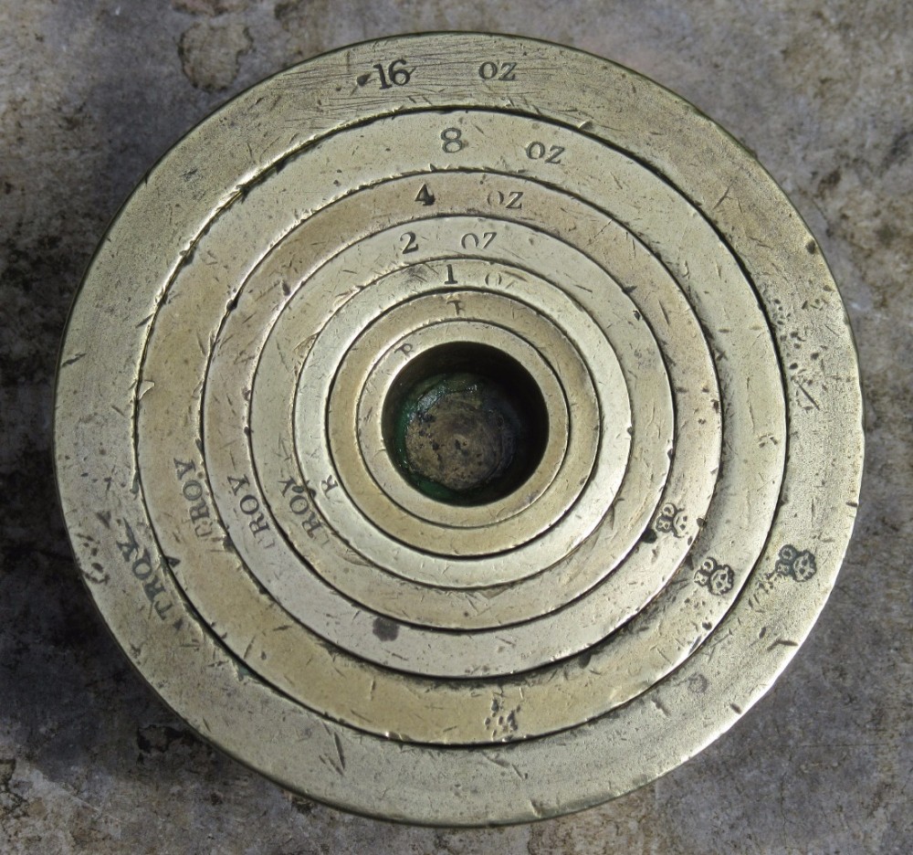SET OF SEVEN GR BRASS NESTING WEIGHTS 