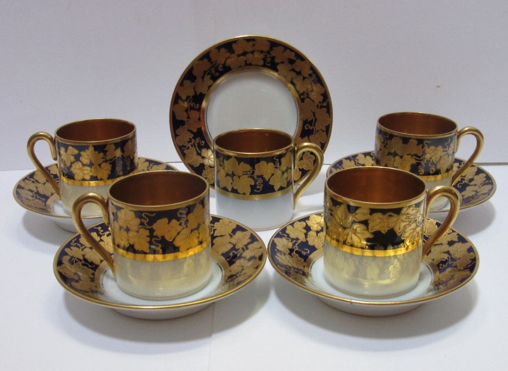 SET OF FIVE EUROPEAN PORCELAIN GILDED COFFEE CANS & SAUCERS 1920