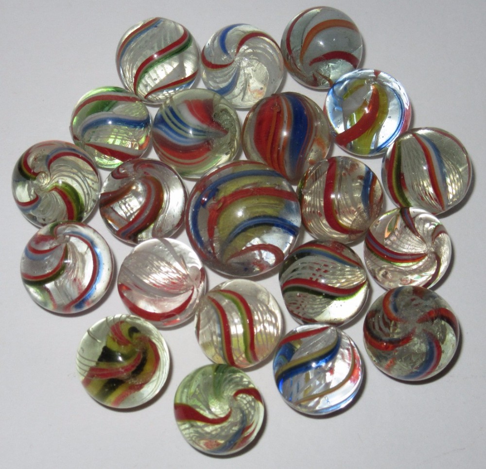 TWENTY-ONE 19th CENTURY ANTIQUE LATTICINO & SWIRL MARBLES