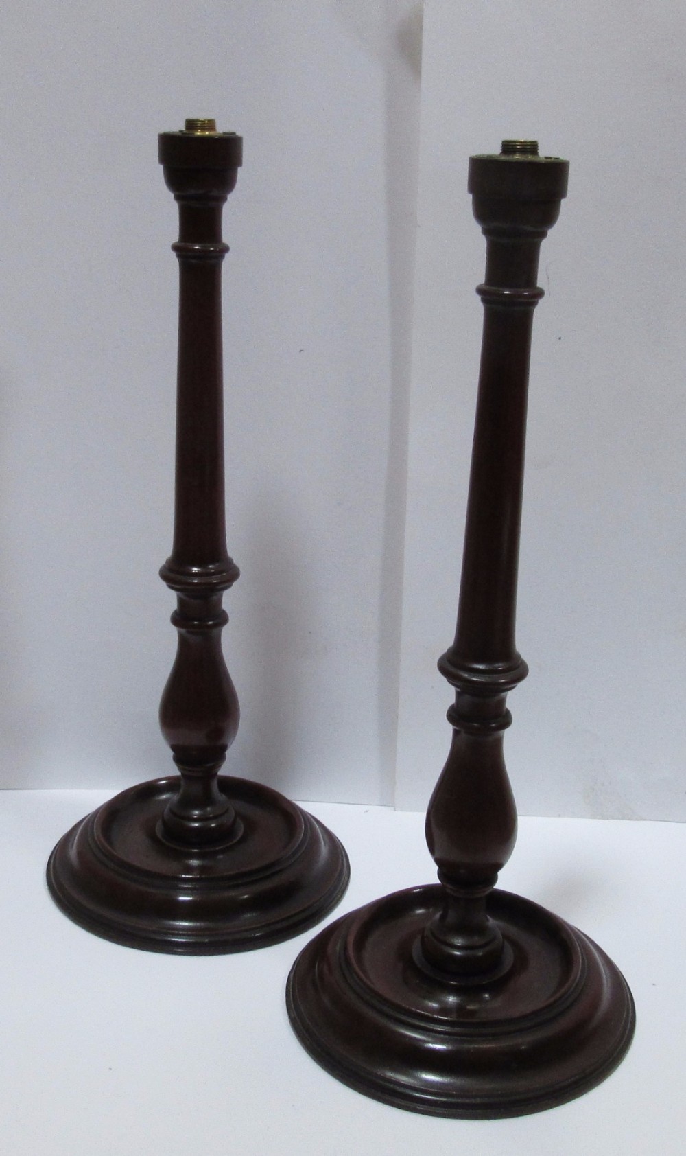 PAIR OF EDWARDIAN TURNED MAHOGANY LAMPS c1910