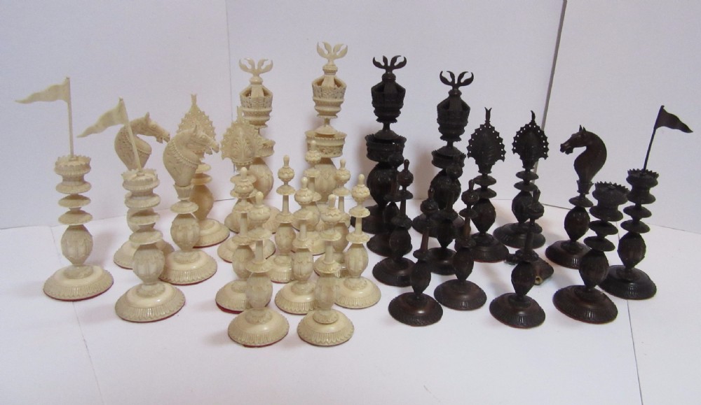 19th C CARVED VIZAGAPATAM CHESS SET View X