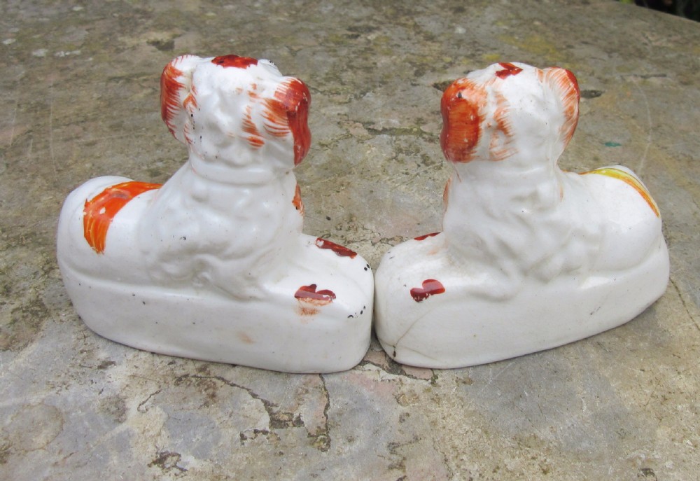 PAIR OF SMALL VICTORIAN RECUMBENT STAFFORDSHIRE DOGS c1860 View IV