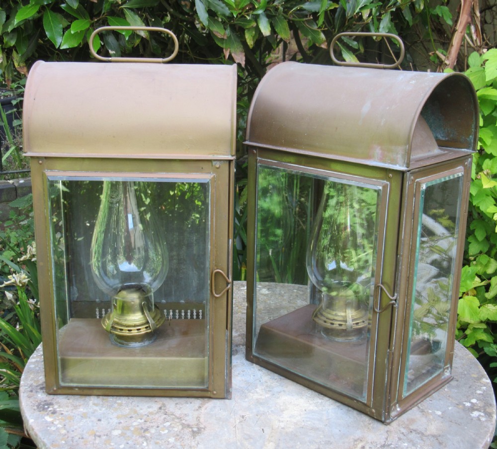 PAIR EDWARDIAN WEATHERED BRASS WALL LANTERNS