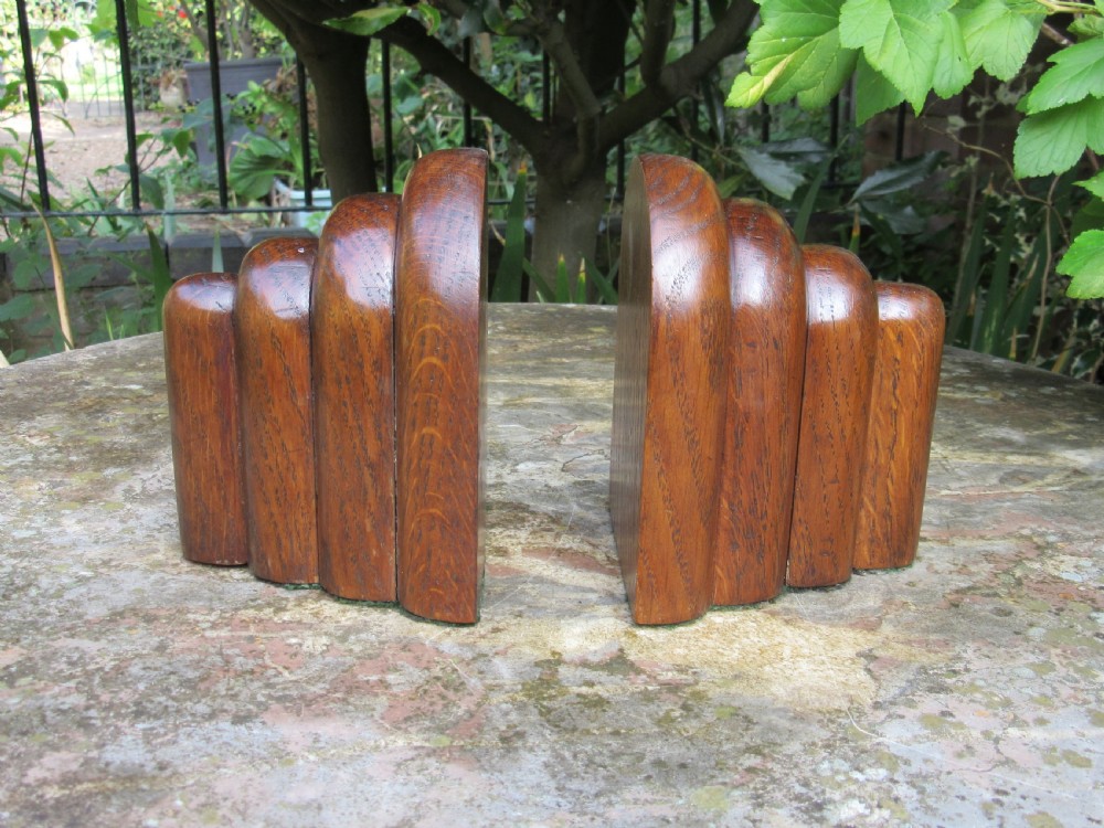 PAIR OF ART DECO SOLID OAK ODEON STYLE BOOKENDS