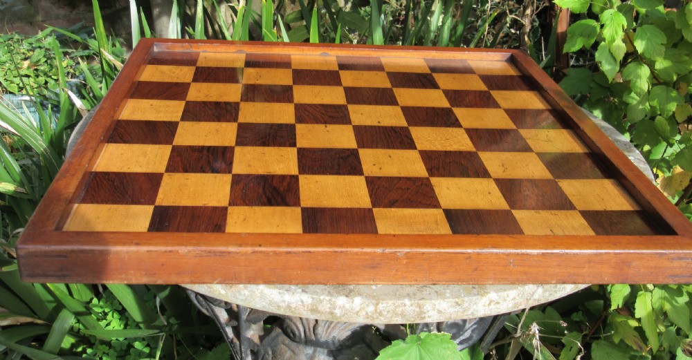 LARGE VICTORIAN ROSEWOOD, MAHOGANY AND MAPLE CHESS BOARD View III