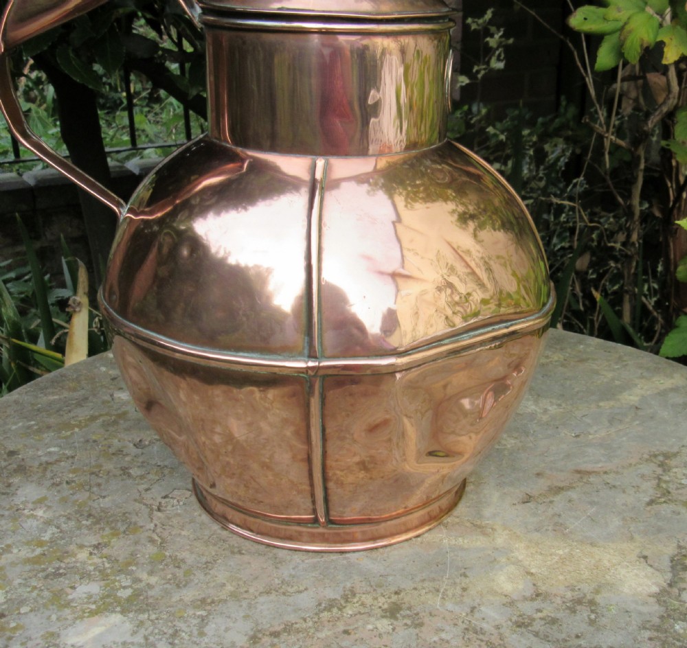 FIVE GRADUATED MARTIN'S GUERNSEY COPPER MILK JUGS  View III