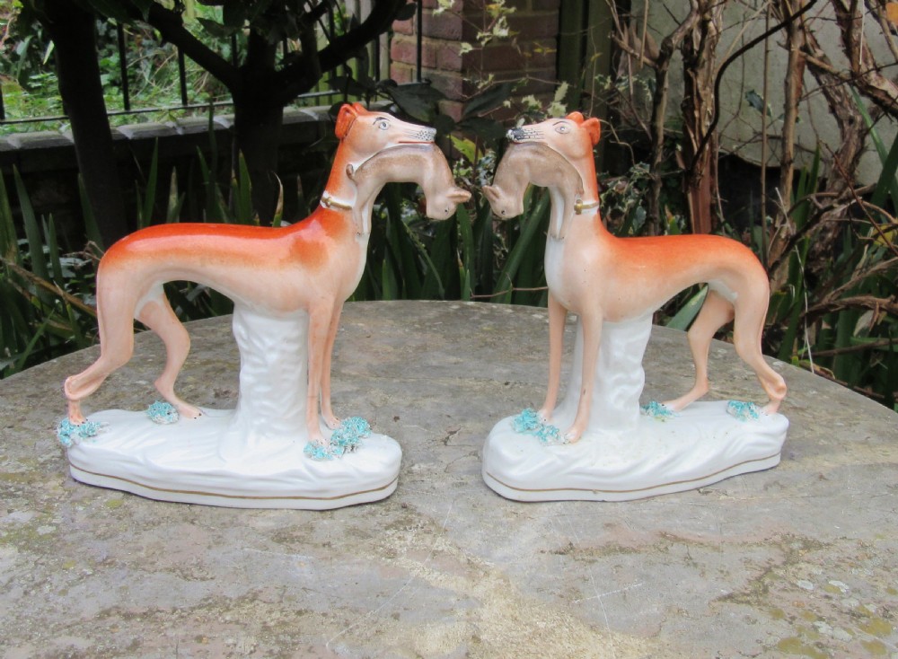 PAIR OF VICTORIAN STAFFORDSHIRE GREYHOUNDS c1860