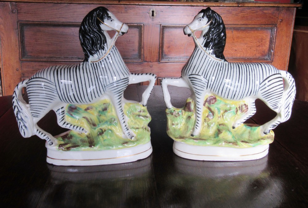 GOOD PAIR OF STAFFORDSHIRE ZEBRAS c1860