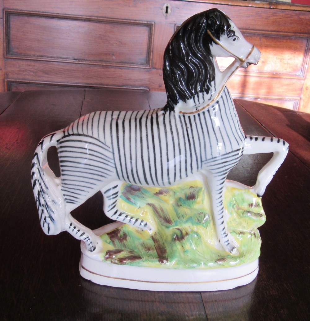 GOOD PAIR OF STAFFORDSHIRE ZEBRAS c1860 View III