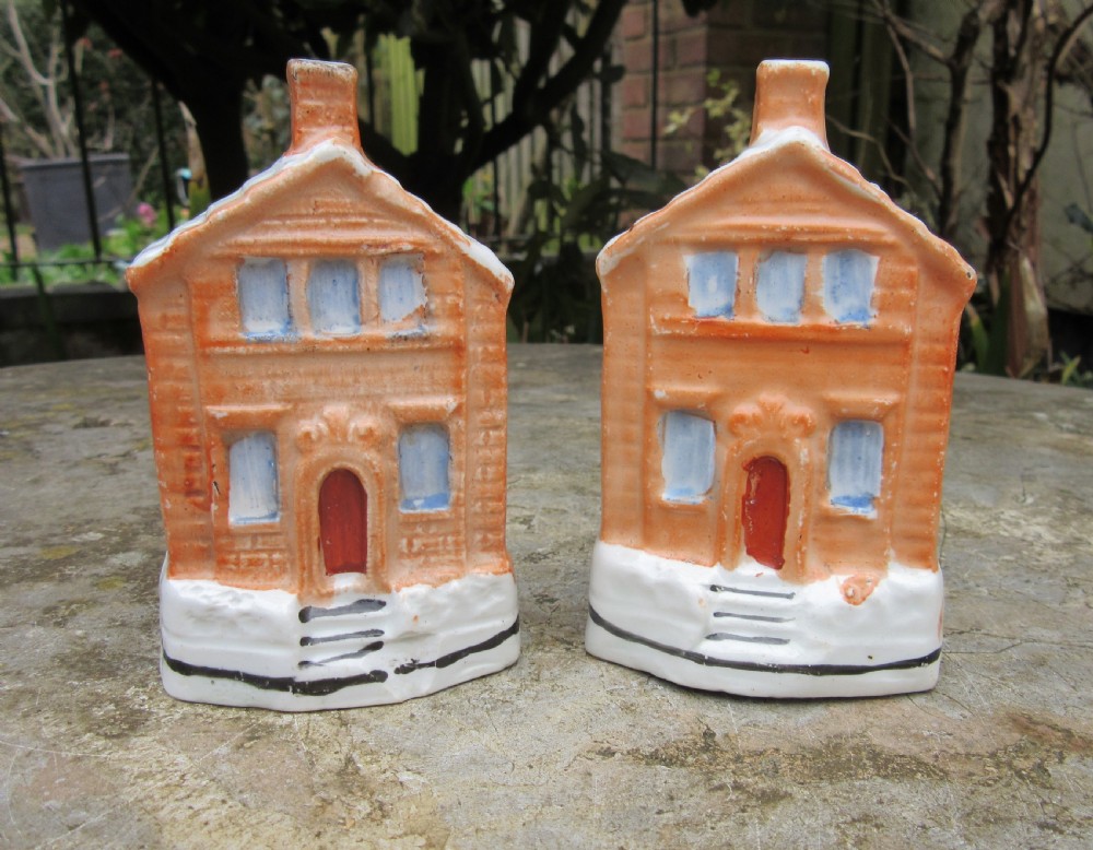 PAIR OF VICTORIAN STAFFORDSHIRE COTTAGE MONEY BOXES c1880