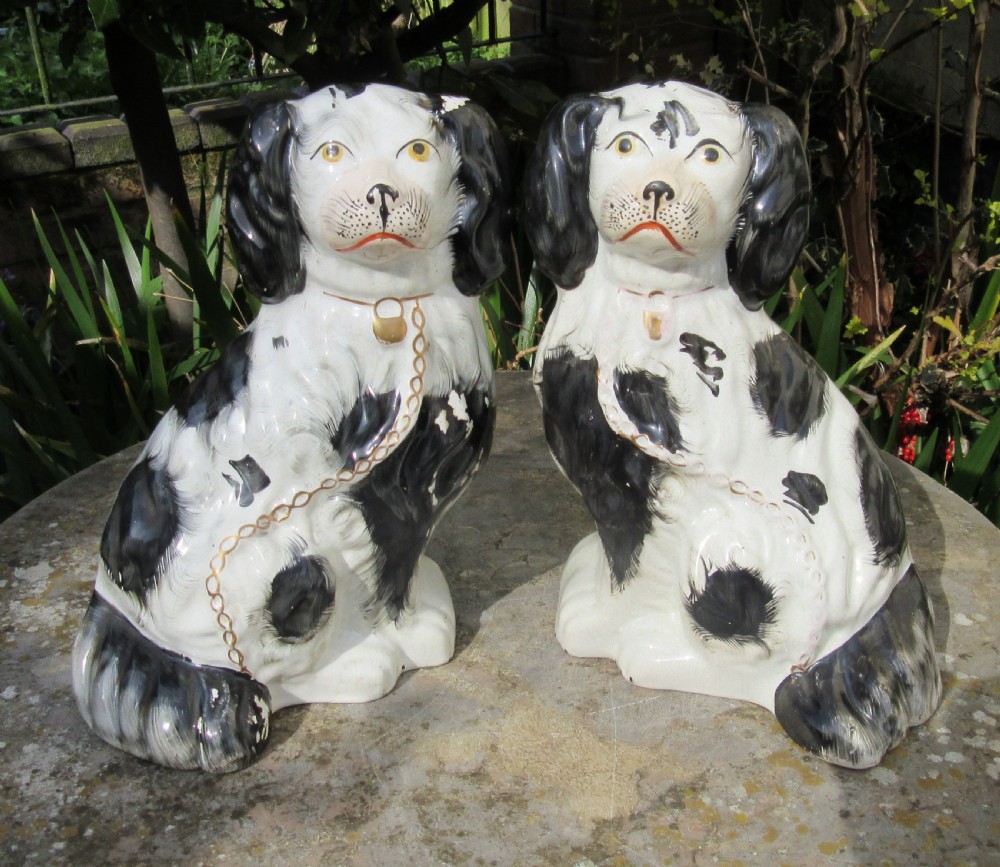 LARGE PAIR OF VICTORIAN STAFFORDSHIRE BLACK & WHITE DOGS 