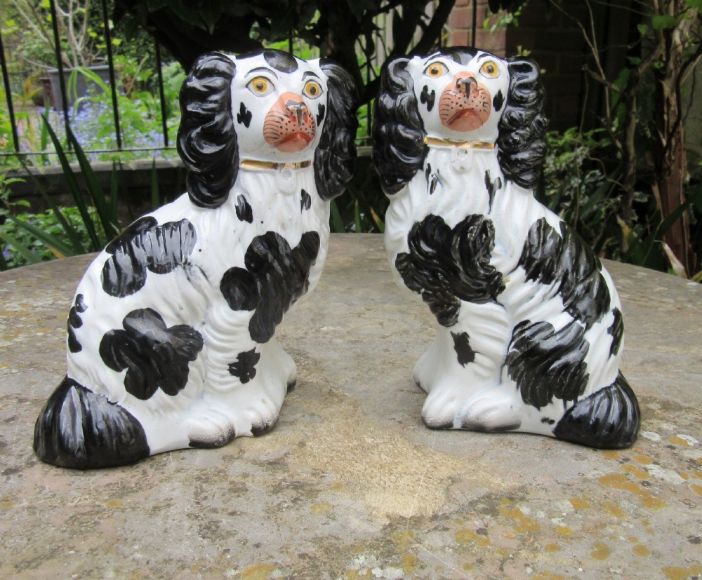 PAIR OF VICTORIAN BLACK & WHITE STAFFORDSHIRE DOGS 