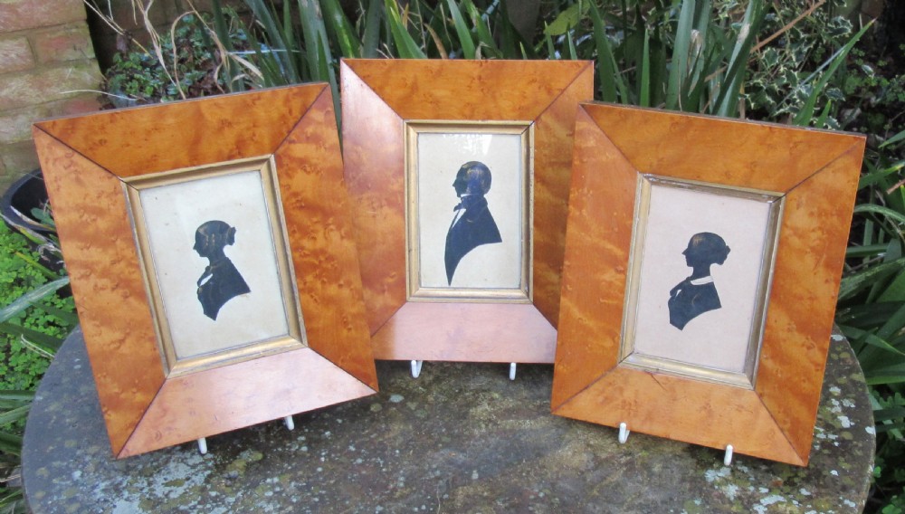 SET OF THREE MAPLE FRAMED SILHOUETTES c1840