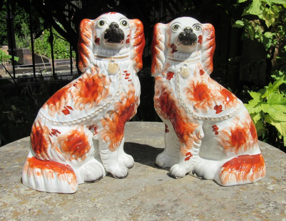 GOOD PAIR OF RED & WHITE STAFFORDSHIRE DOGS c1860
