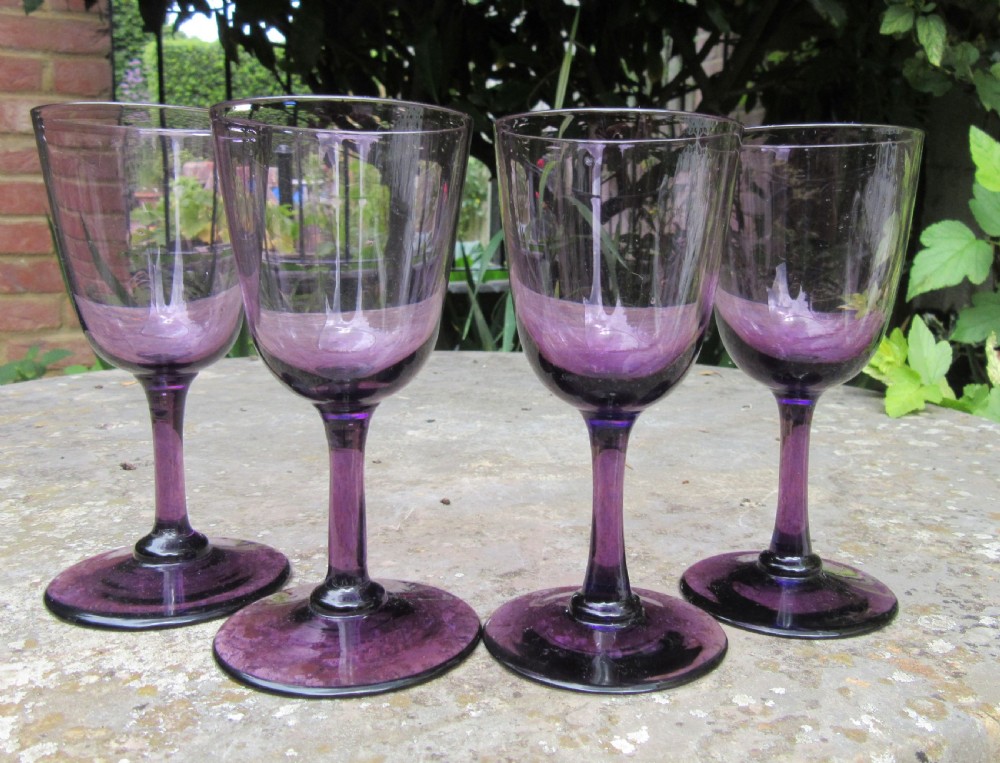 SET OF FOUR VICTORIAN AMETHYST WINE GLASSES