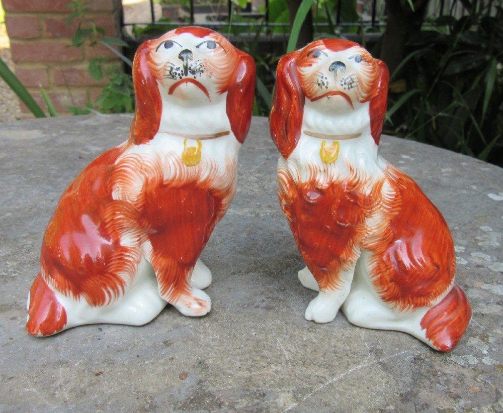 CHARMING PAIR OF STAFFORDSHIRE RED & WHITE DOGS c1860