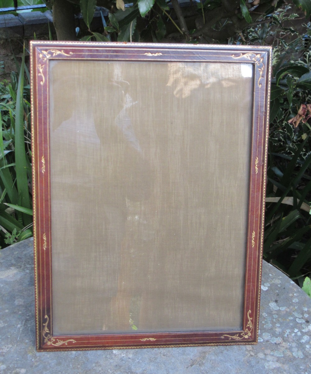 LARGE HARRODS TOOLED LEATHER PHOTO FRAME c1910