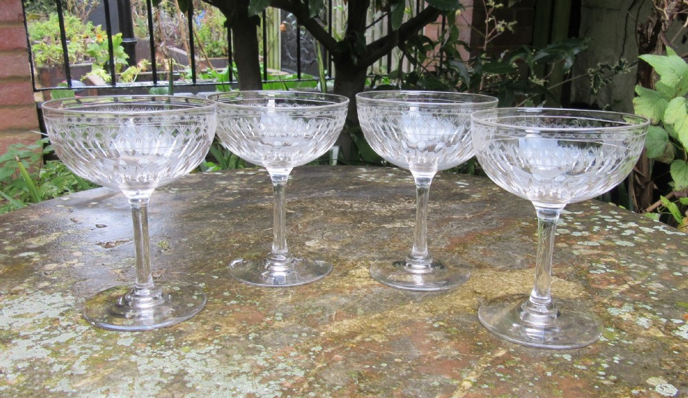 SET OF FOUR CUT GLASS CHAMPAGNE COUPES c1910