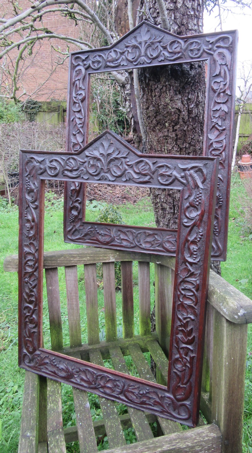 TWO ANTIQUE CARVED OAK FRAMES 