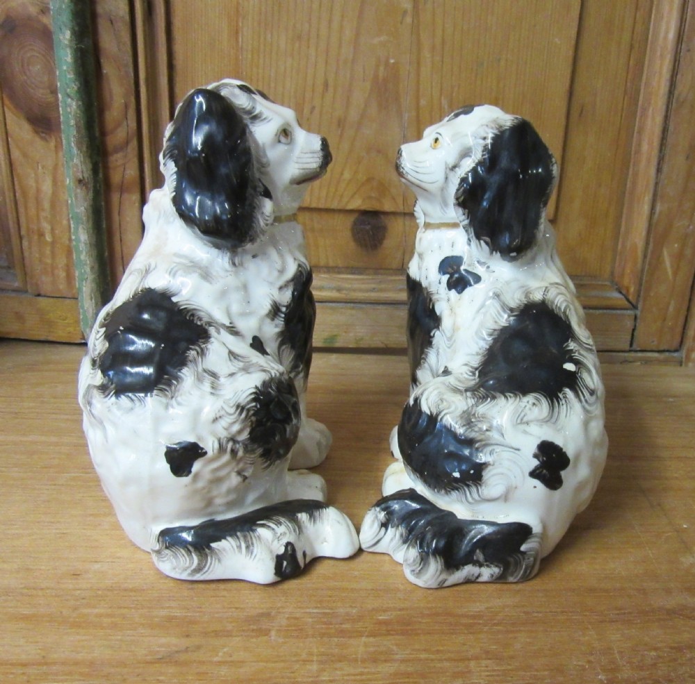 PAIR OF BLACK & WHITE PORCELLANEOUS STAFFORDSHIRE DOGS c1840 View II