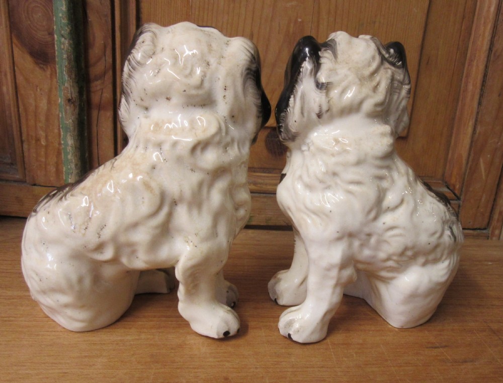 PAIR OF BLACK & WHITE PORCELLANEOUS STAFFORDSHIRE DOGS c1840 View III