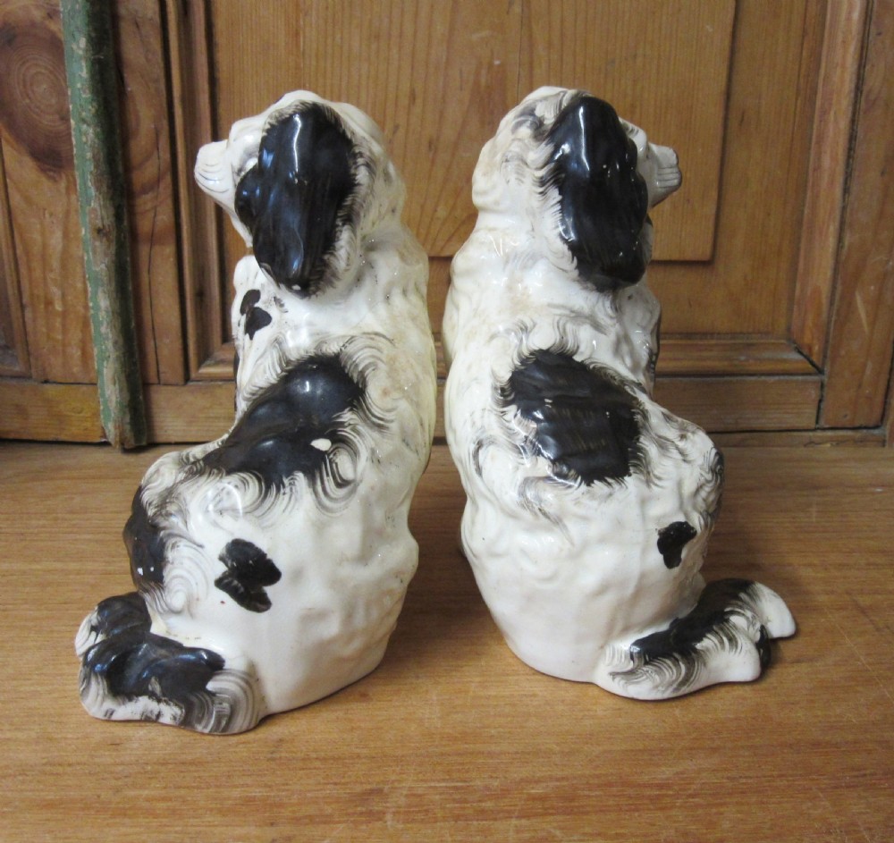 PAIR OF BLACK & WHITE PORCELLANEOUS STAFFORDSHIRE DOGS c1840 View V
