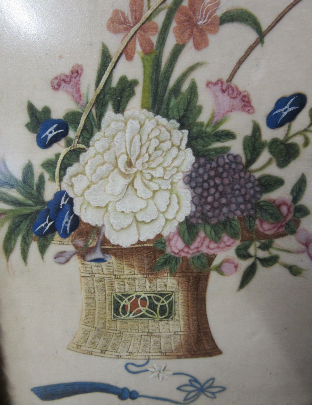 A 19th-century Chinese painting showing a woven basket filled with flowers inside a moulded gilt frame. View II