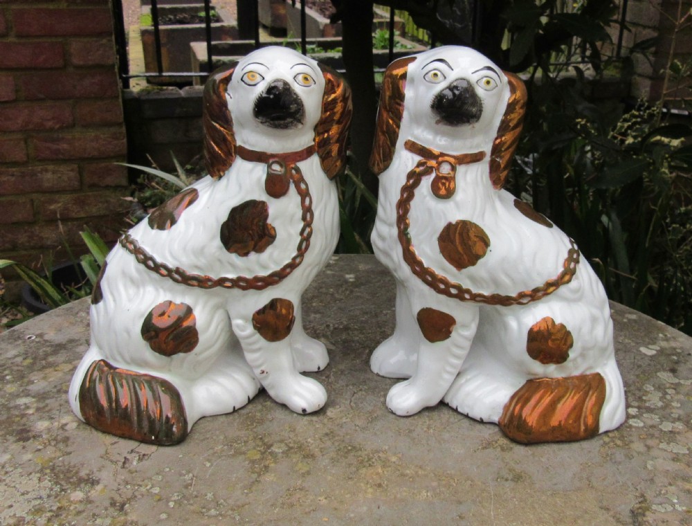 PAIR VICTORIAN STAFFORDSHIRE COPPER LUSTRE DOGS c1860