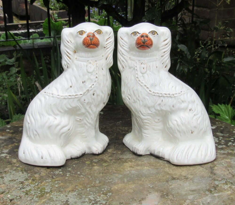PAIR WHITE & GILT STAFFORDSHIRE DOGS c1880