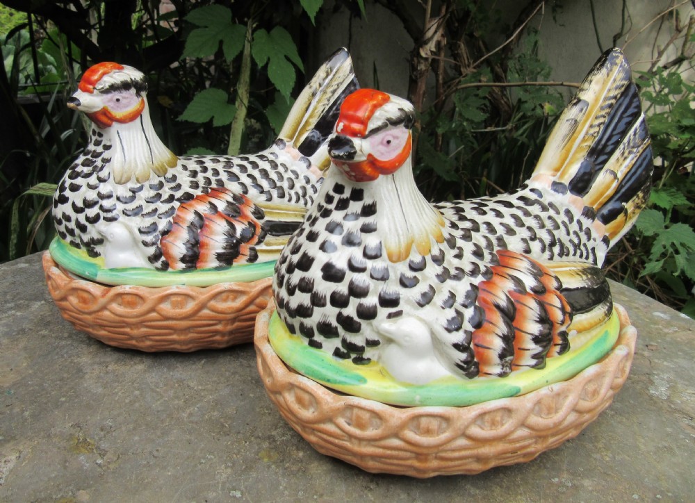 TWO STAFFORDSHIRE HENS ON NESTS c1860
