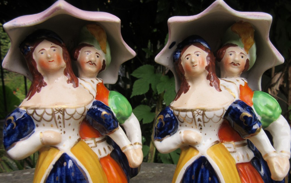TWO MATCHING STAFFORDSHIRE DANCING UMBRELLA FIGURES c1860 View V