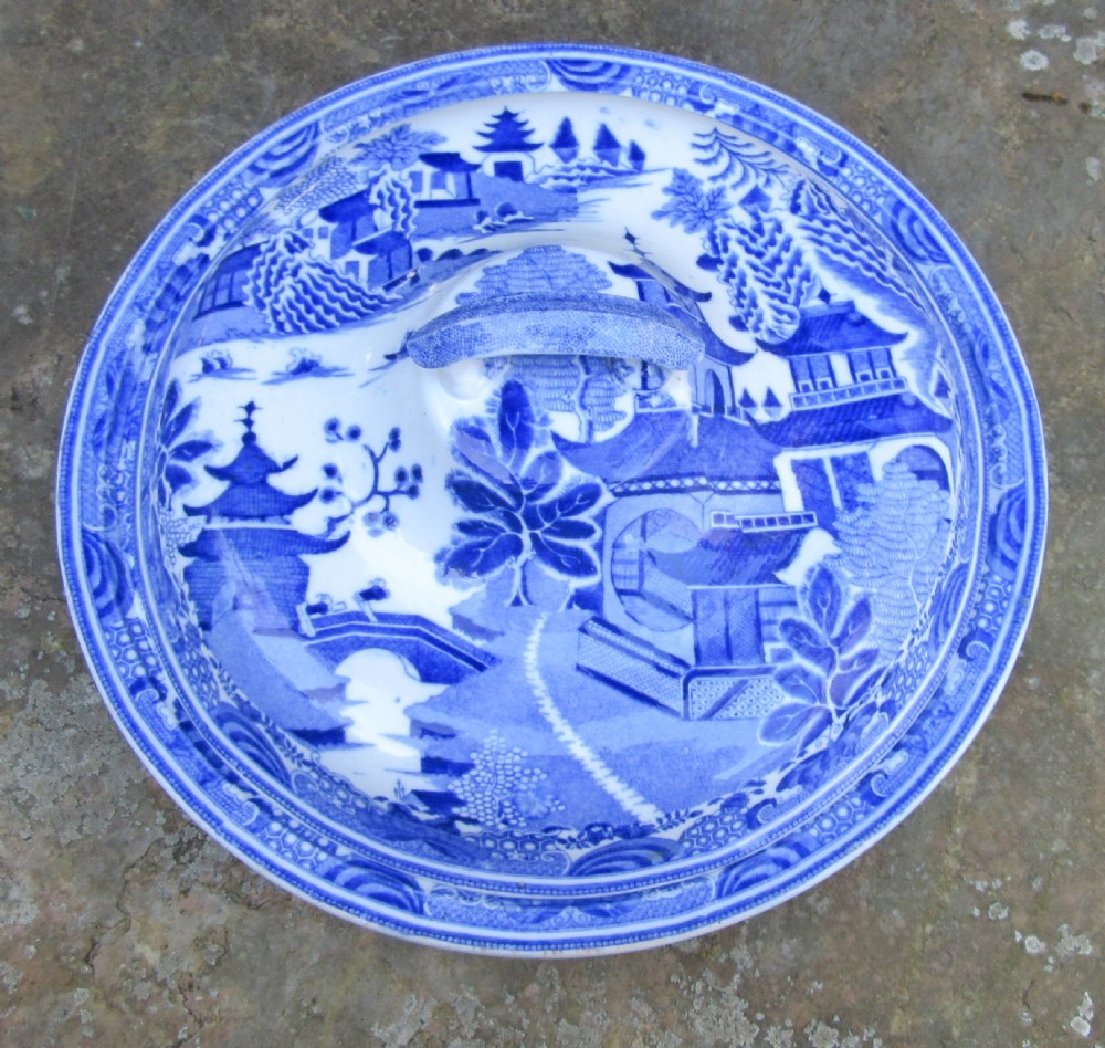 An antique early Victorian Copeland and Garrett blue and white transferware ceramic tureen with a domed lid and landscape pattern. View II
