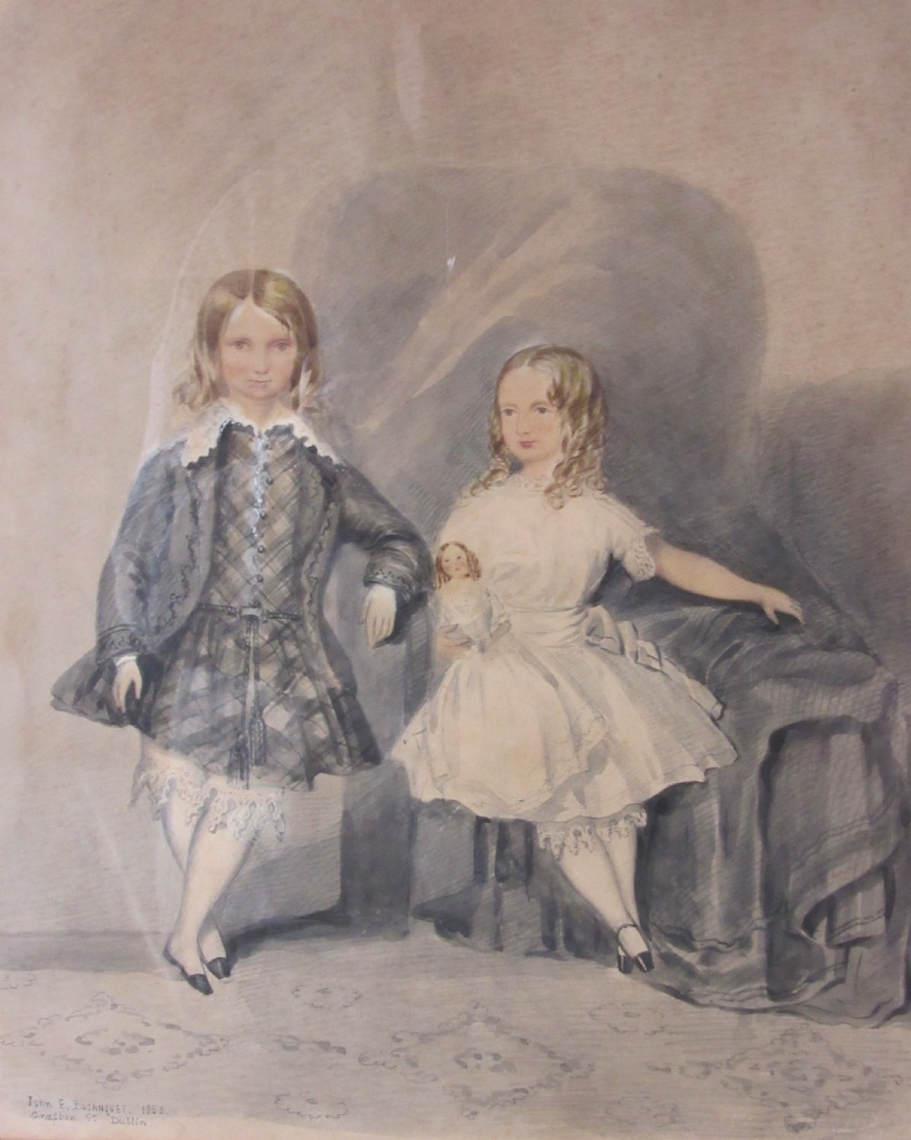 Framed 19th-century watercolour painting depicting two young children in mid-Victorian attire, presented in a light-coloured mount and dark wood frame. View II