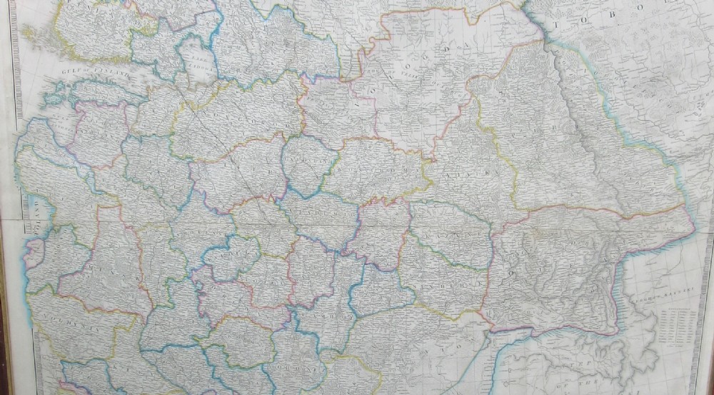 A large framed mid-19th-century map detailing the Russian Dominions in Europe with hand-coloured regional boundary lines. View VI