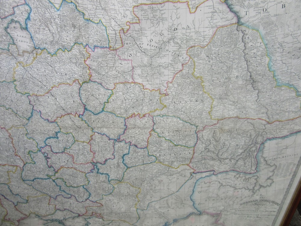 A large framed mid-19th-century map detailing the Russian Dominions in Europe with hand-coloured regional boundary lines. View VII