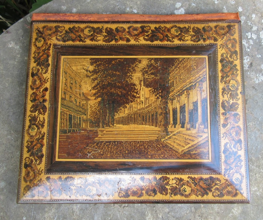 A Victorian Tunbridge ware writing folder featuring a micro-mosaic wood inlay depicting The Pantiles surrounded by a floral mosaic border. View II