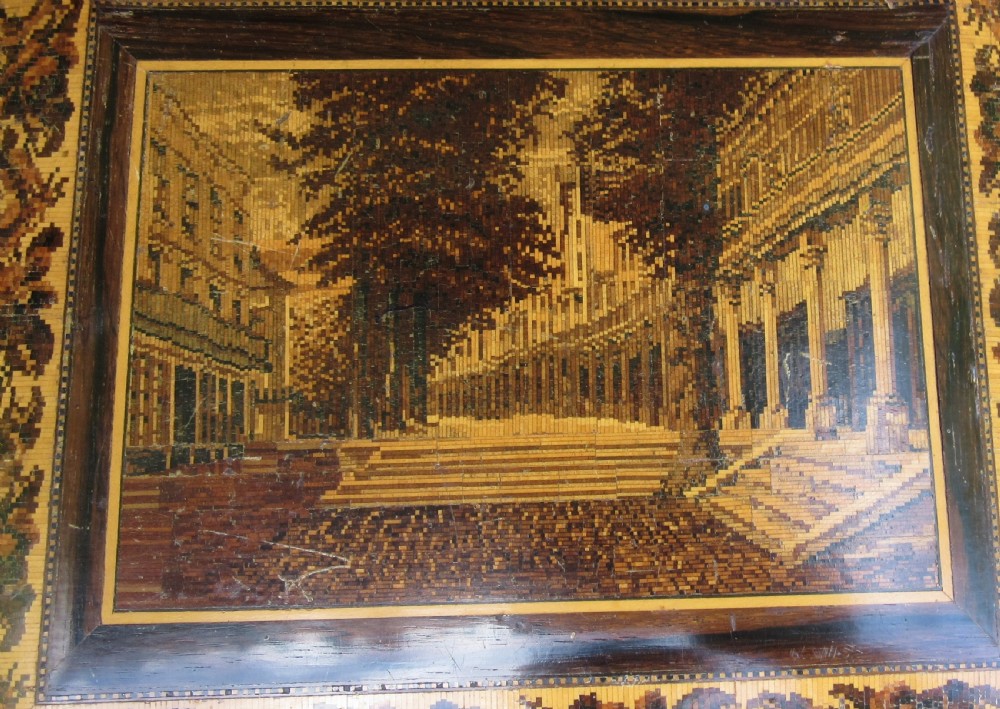 A Victorian Tunbridge ware writing folder featuring a micro-mosaic wood inlay depicting The Pantiles surrounded by a floral mosaic border. View V
