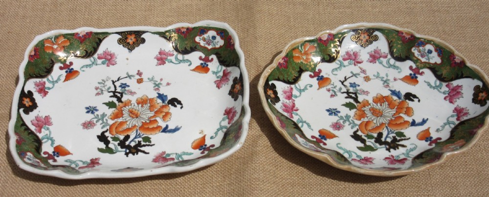 A Regency period Masons Patent Ironstone dessert service featuring hand-painted orange floral patterns and dark green gilded scalloped borders. View III