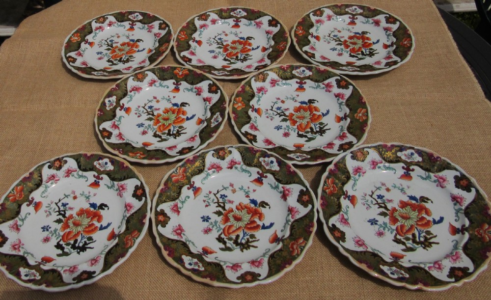 A Regency period Masons Patent Ironstone dessert service featuring hand-painted orange floral patterns and dark green gilded scalloped borders. View V